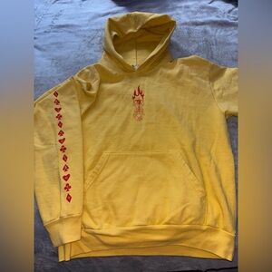 Supreme Yellow Hoodie with Red Graphic
